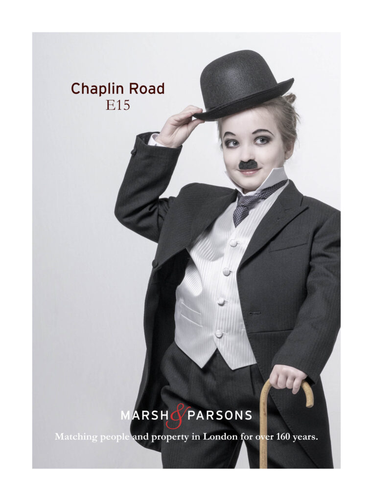 young girl dressed as Charlie Chaplin - Copy reads Chaplin Road E15 - Marsh & Parsons logo