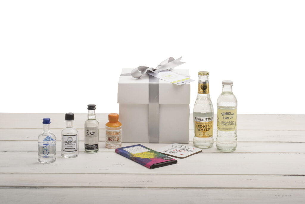 gift box with gins and tonics and chocolate