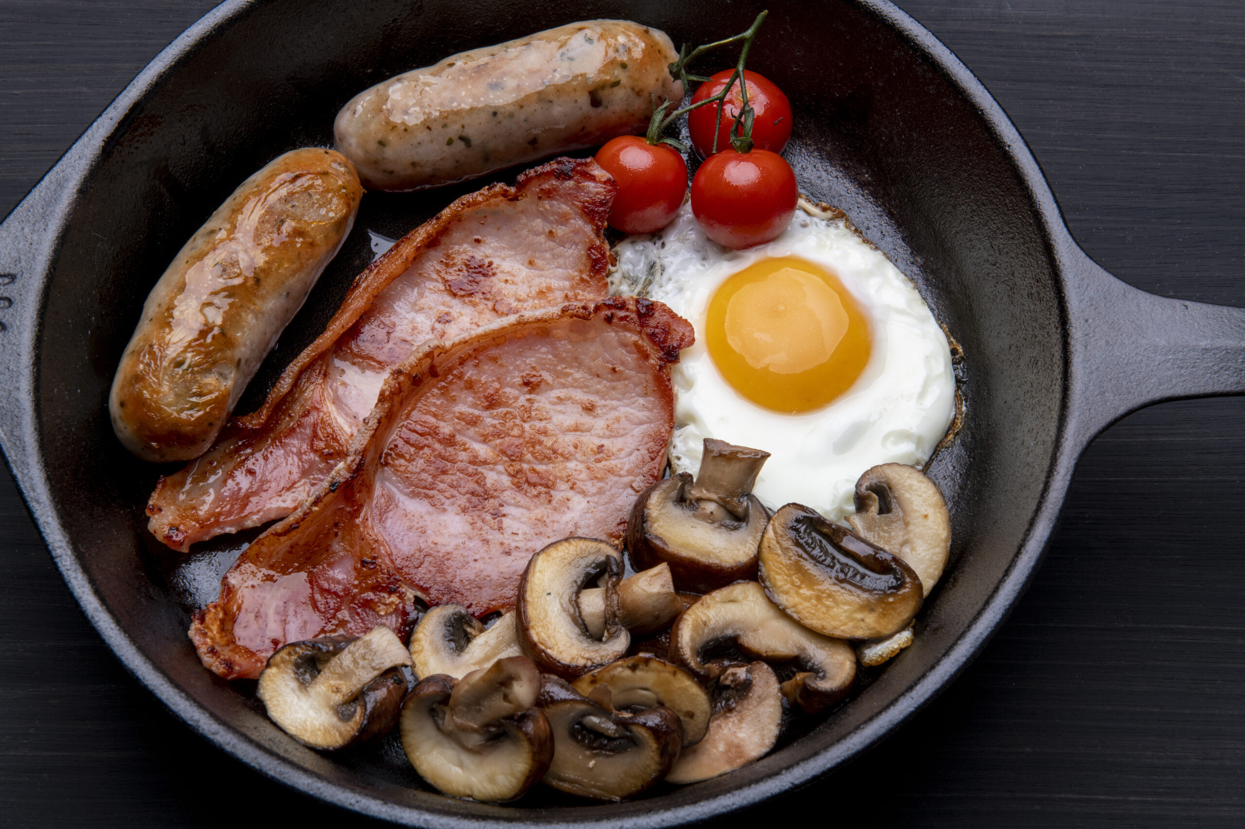 English breakfast in cast iron skillet - cooked