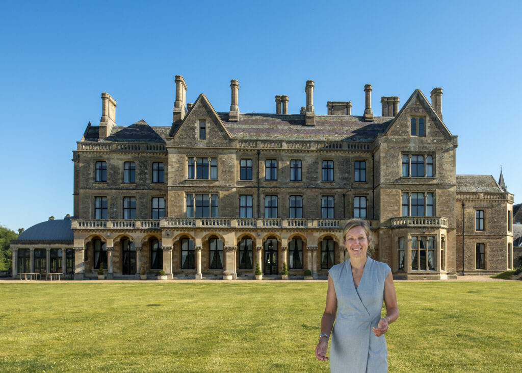 Manager in front of Hotel - Walton Hall -