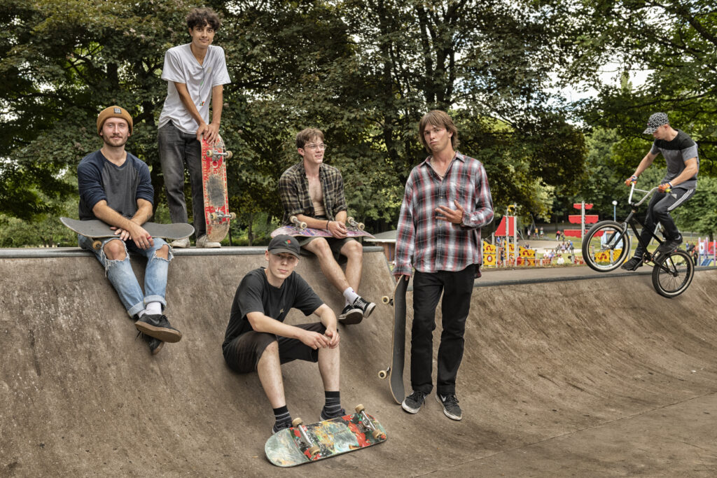 Lads at skatepark posing to camera