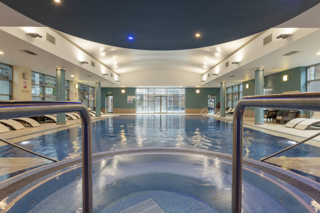Swimming pool with lighting showing application of heating boilers installed in Hotel