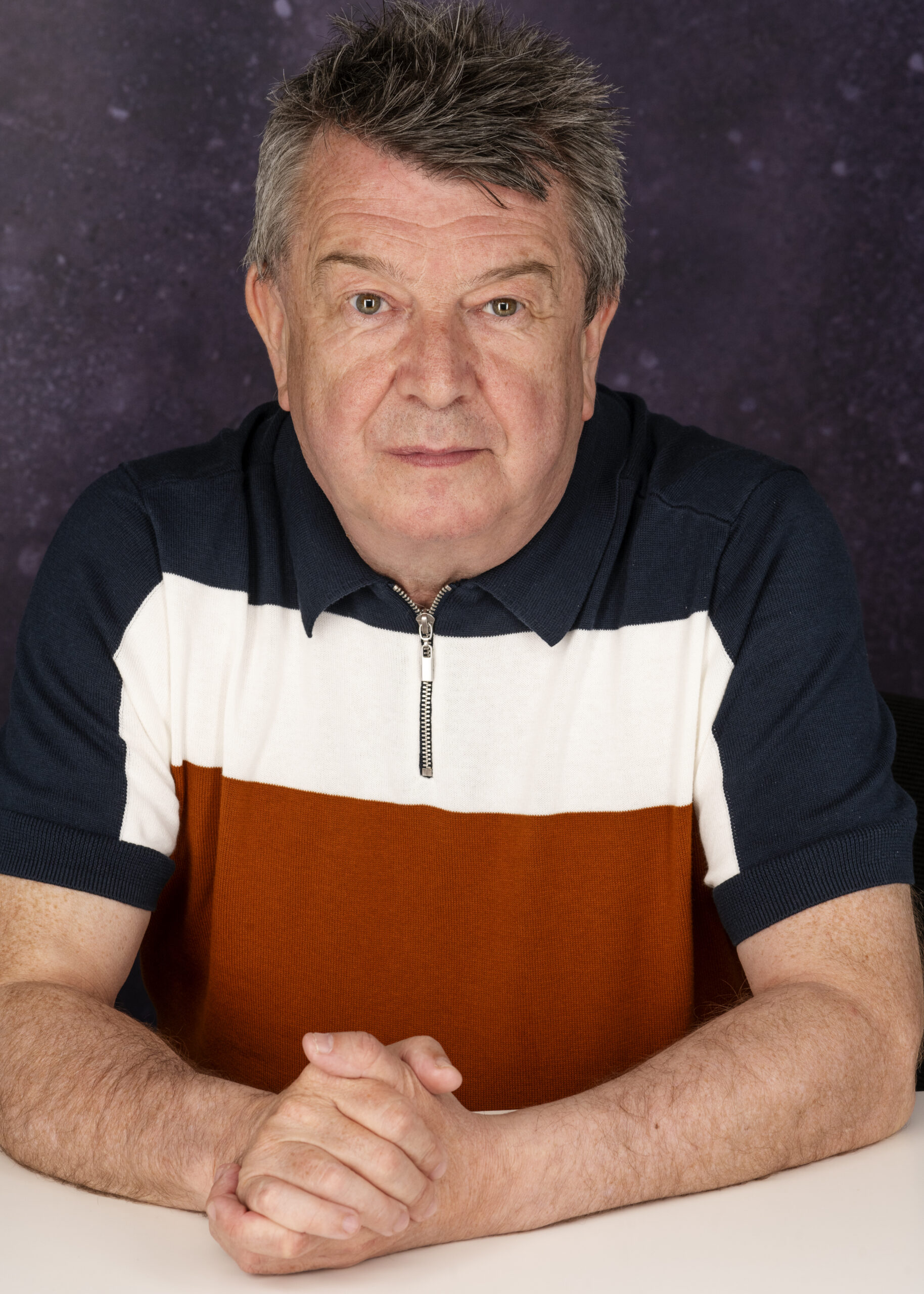 Stuart Maconie looking to camera