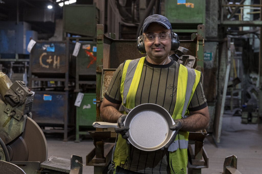 worker with industrial product