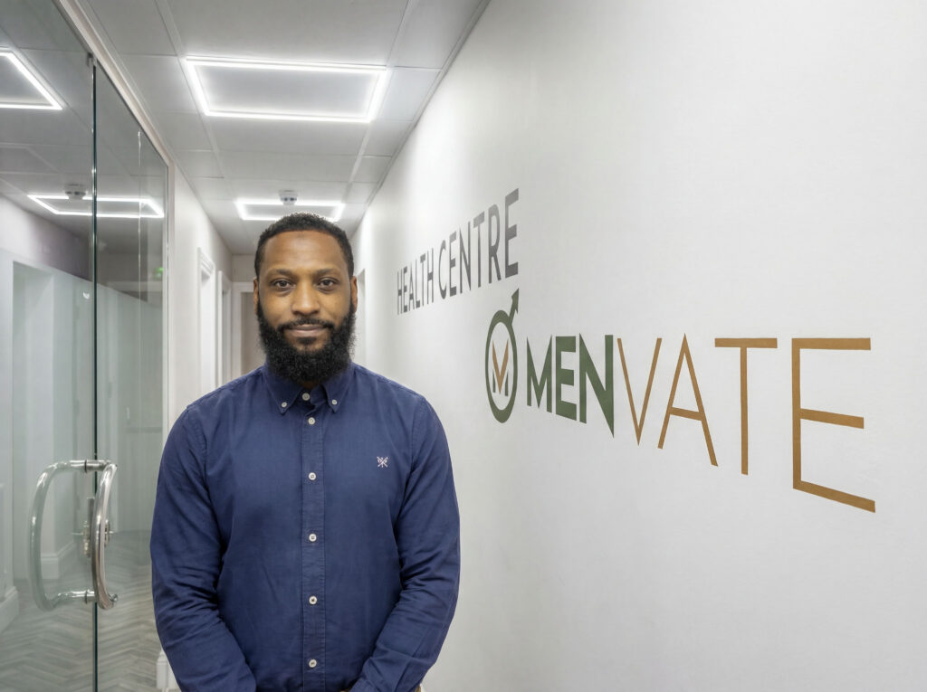 Doctor in clinic with Menvate branding